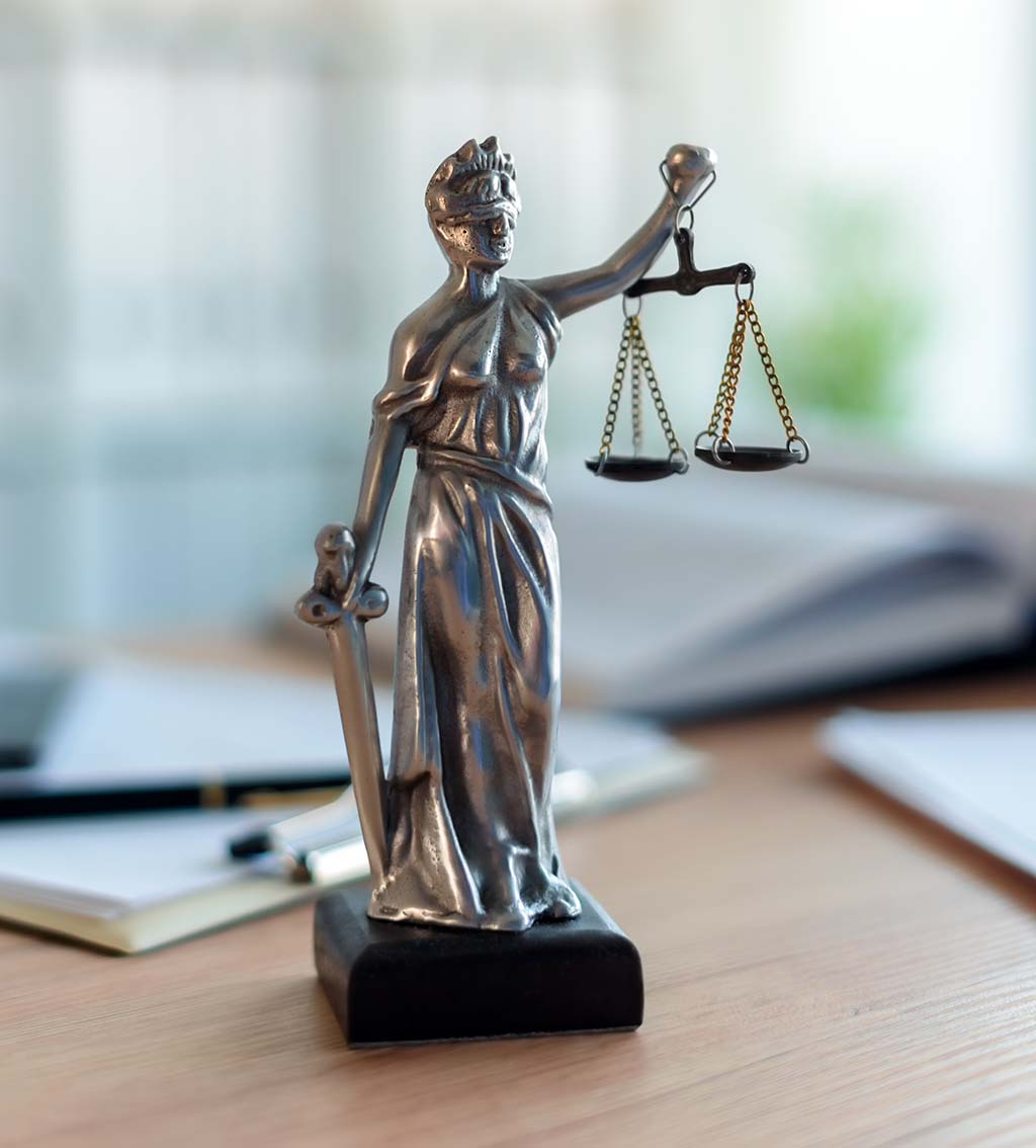 lady justice statue in a lawyer office