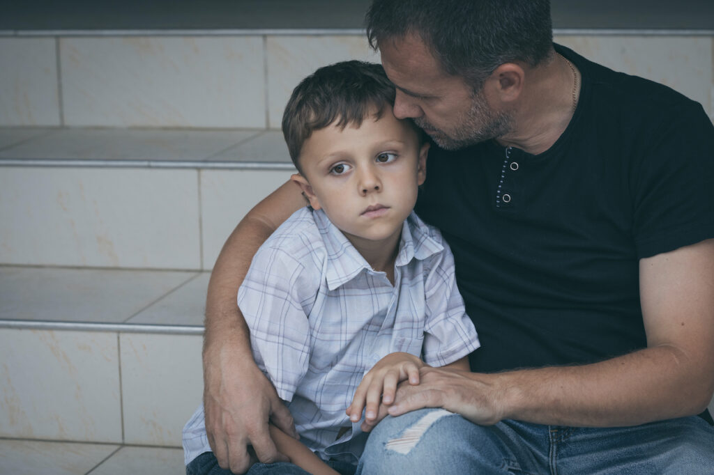 boy sad about father losing visitation rights